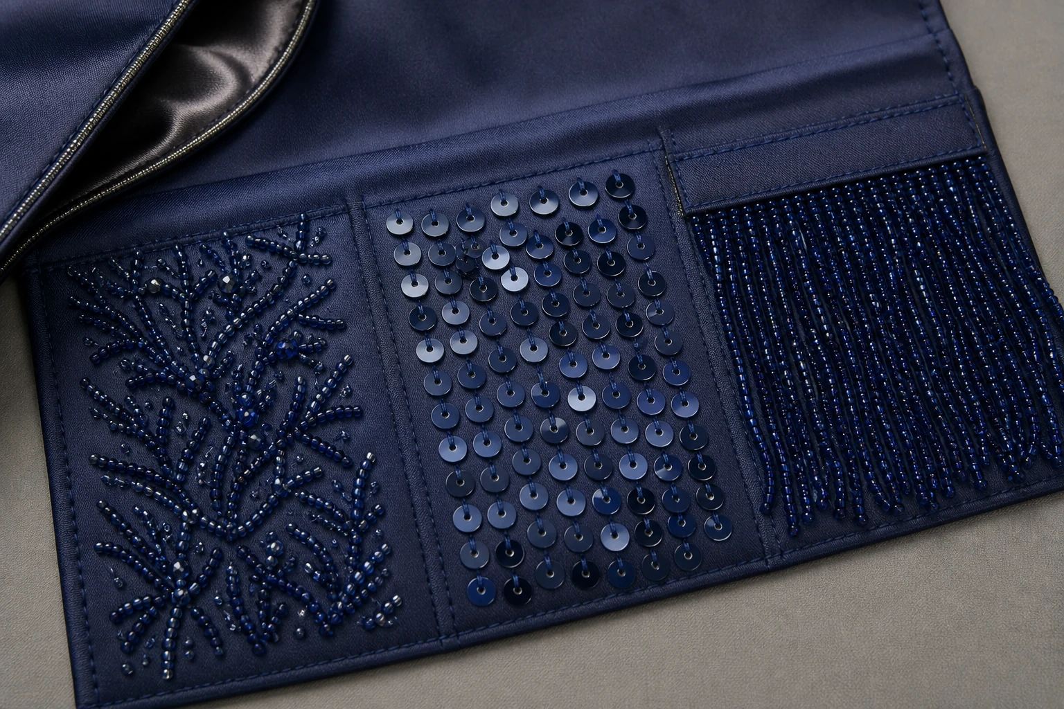 Three navy sample panels comparing bead embroidery, sequins and beaded fringe attachment.